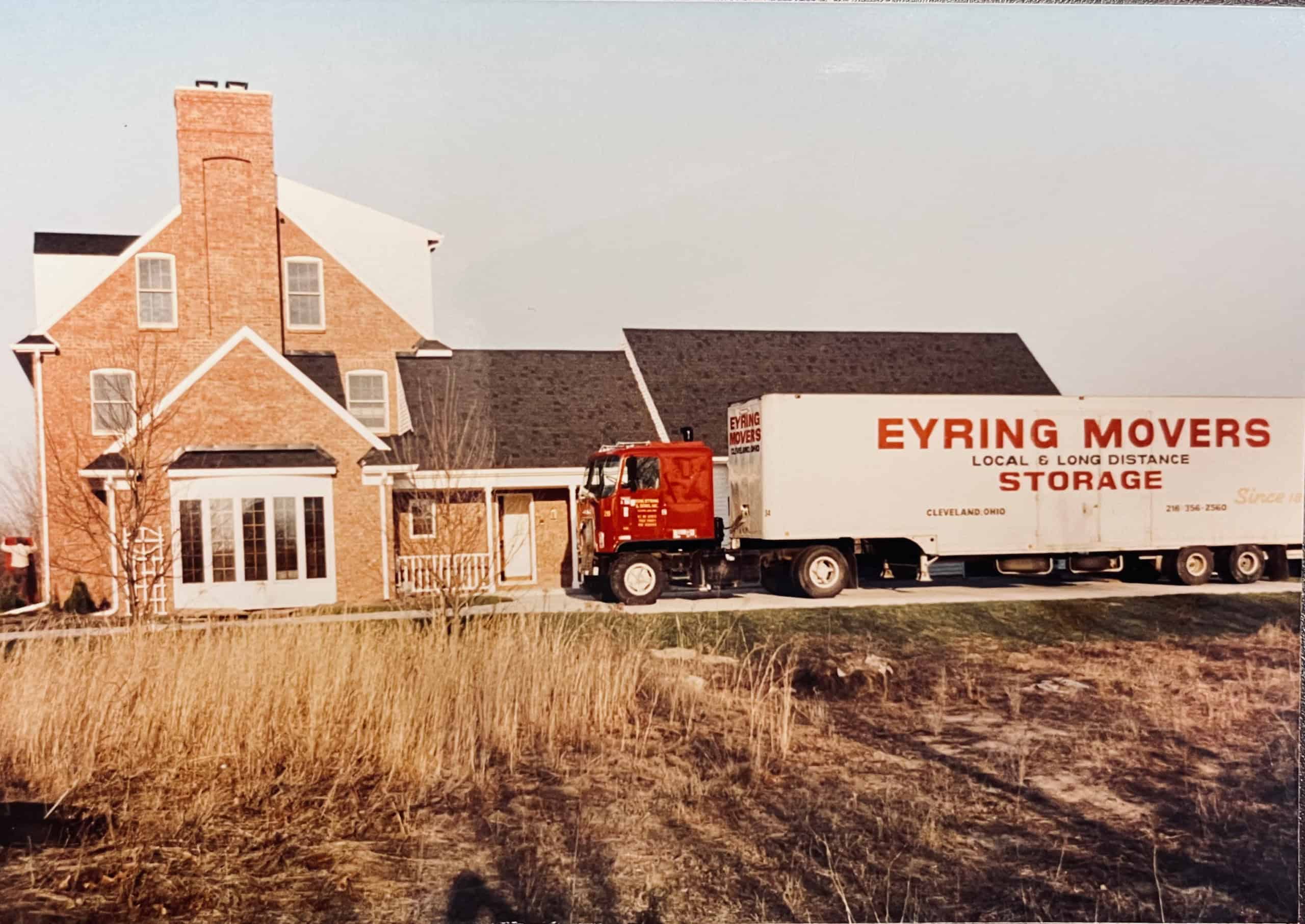 A red Edw. Eyring & Sons Kenworth cabover moving truck based in Cleveland, Ohio